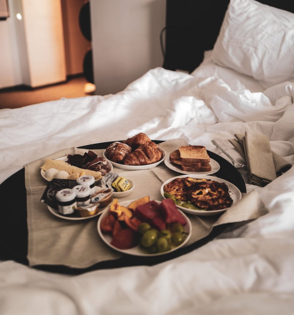 Hotel bed with breakfast