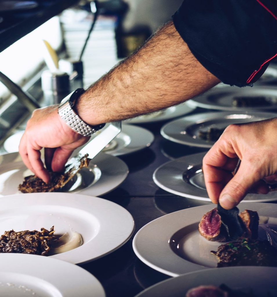 Chef plating food